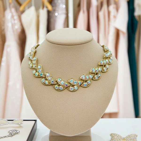 Perfect for vintage jewelry lovers: our golden rhinestone necklace provides dazzling herringbone sparkle and an adjustable 15" fit. Shop today!