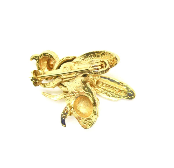 This Gerry's vintage golden bee brooch boasts exquisite detailing, ensuring a 1 1/2" inch wide diameter that presents in mint condition.