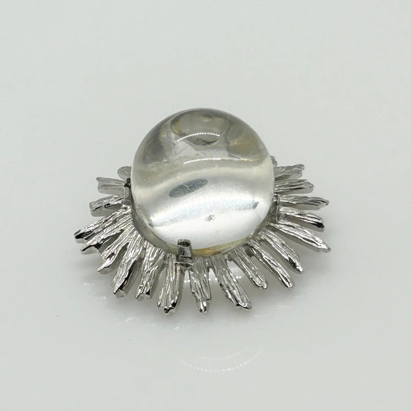 Perfect for vintage jewelry lovers: our Vintage Clear Bubble Brooch with Silvetone Frame provides a unique clear glass sphere design. Shop today!