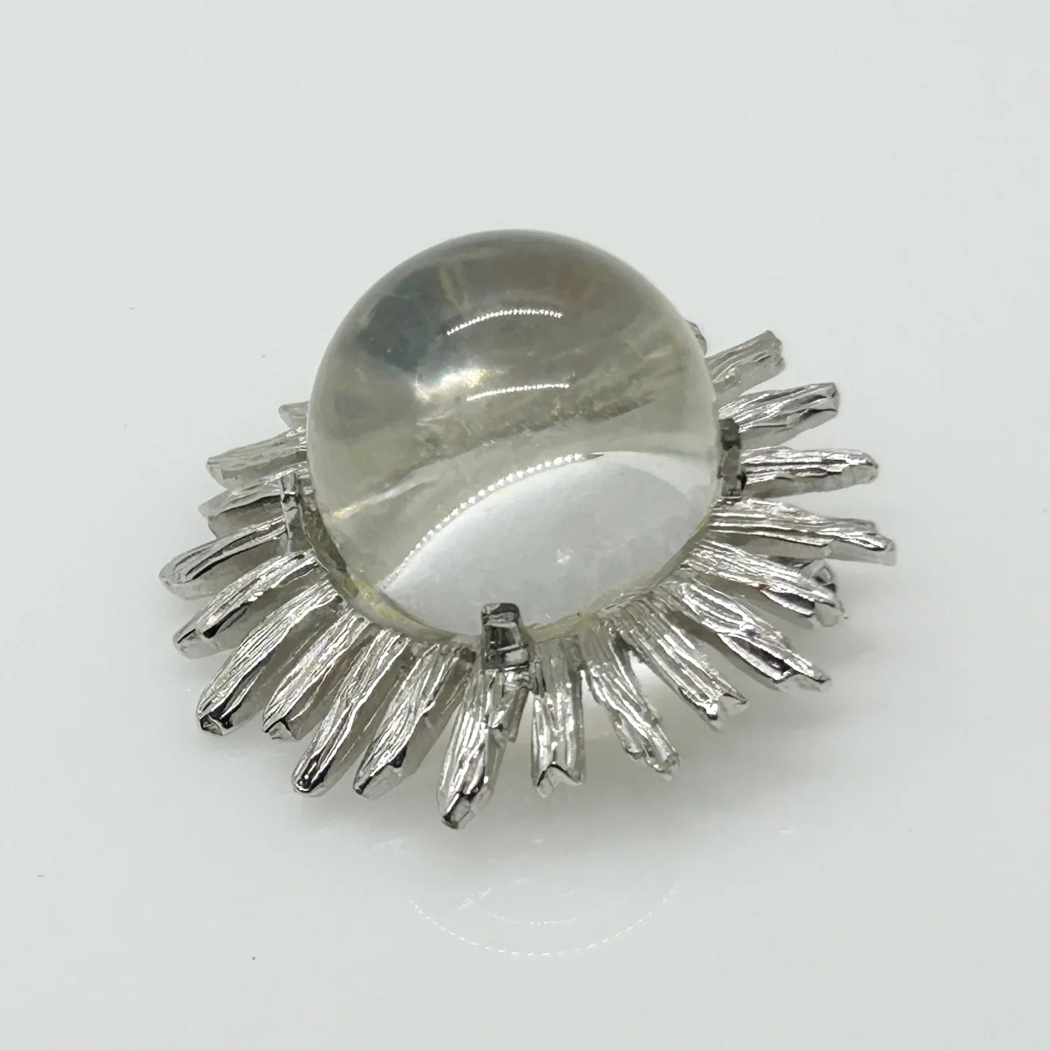 Perfect for vintage jewelry lovers: our Vintage Clear Bubble Brooch with Silvetone Frame provides a unique clear glass sphere design. Shop today!
