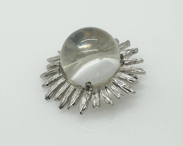Perfect for vintage jewelry lovers: our Vintage Clear Bubble Brooch with Silvetone Frame provides a unique clear glass sphere design. Shop today!