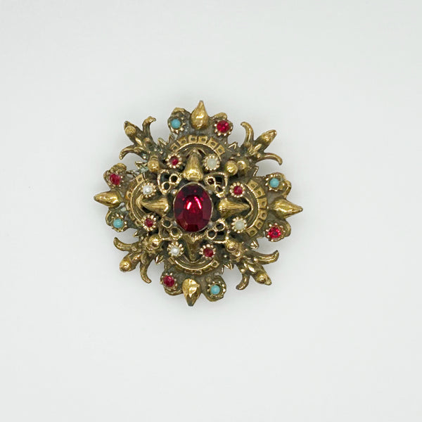 Vintage Ornate Brooch with Glittering Red Center