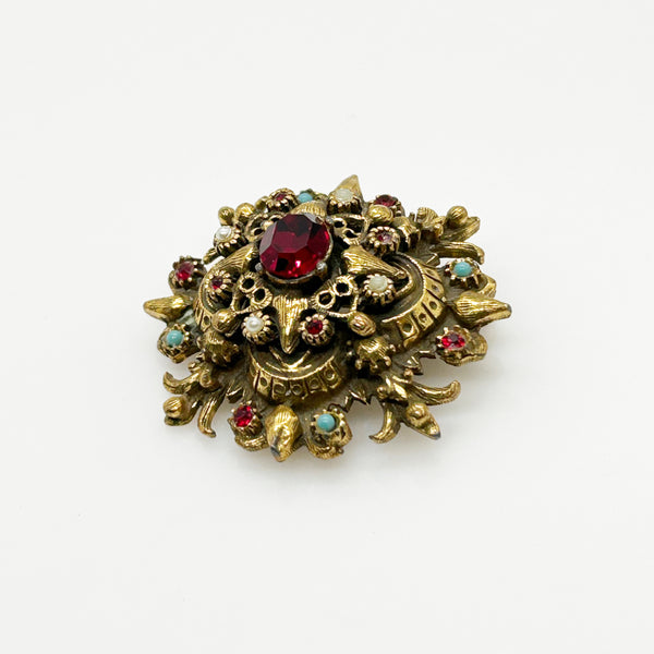 Vintage Ornate Brooch with Glittering Red Center