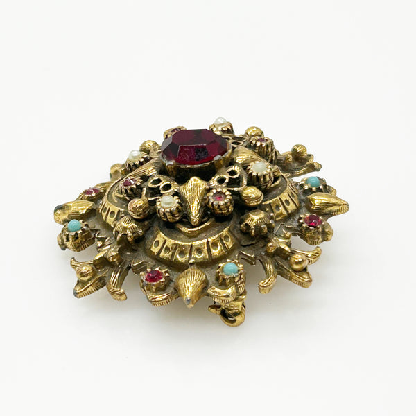 Vintage Ornate Brooch with Glittering Red Center