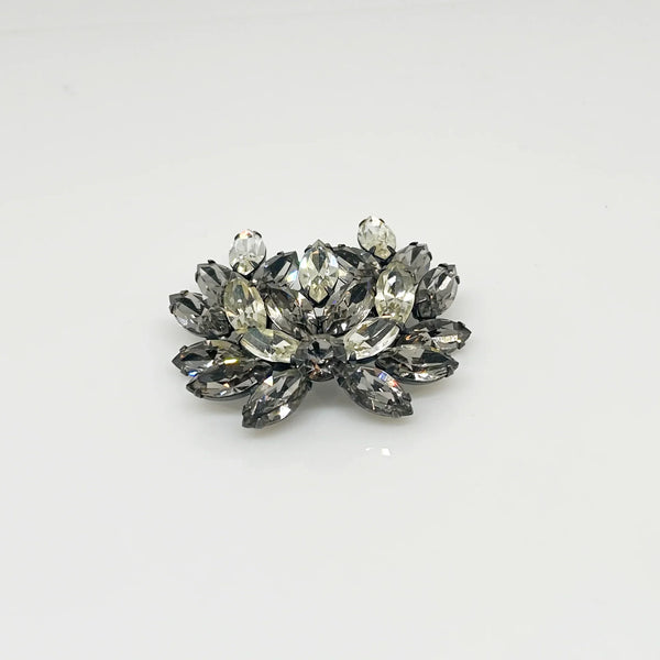 This is a gorgeous set of pin made with marquise and round shaped rhinestones in gray and clear. The stones are nestled in a layered, dark metal setting. The stones are standout bright and very sparking, great condition other than some wear on reverse. 