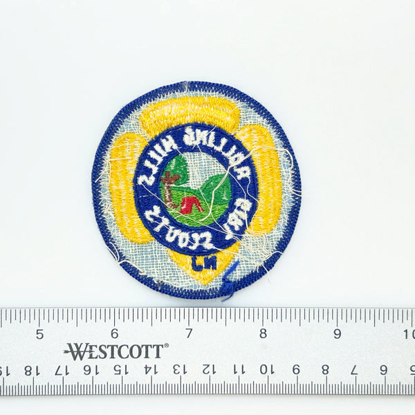 Girl Scouts patch with 'Rolling Hills Girl Scouts' text on a white background