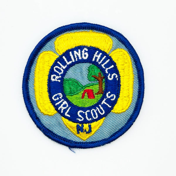 Rolling Hills Girl Scouts patch on a white background