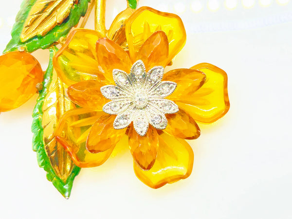 Statement 4" Vintage Butterscotch Floral Brooch provides bold elegance with amber colored petals and sparkling rhinestone center. Shop today!