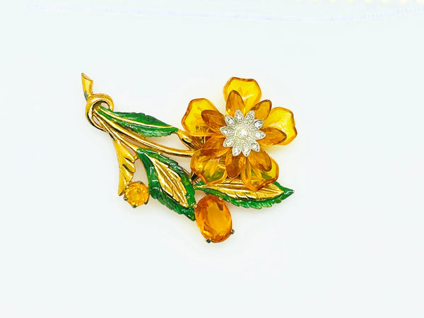 Statement 4" Vintage Butterscotch Floral Brooch provides bold elegance with amber colored petals and sparkling rhinestone center. Shop today!