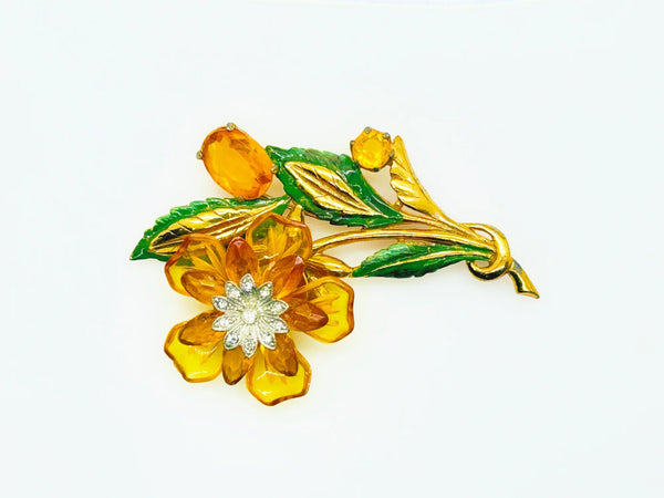 Statement 4" Vintage Butterscotch Floral Brooch provides bold elegance with amber colored petals and sparkling rhinestone center. Shop today!