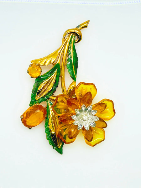 Statement 4" Vintage Butterscotch Floral Brooch provides bold elegance with amber colored petals and sparkling rhinestone center. Shop today!