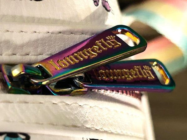  Enjoy the exclusive, pastel rainbow charm of our Loungefly Disney Pastel Rainbow Mickey Mouse Mini Backpack. Adjustable straps add comfort. Very hard to find