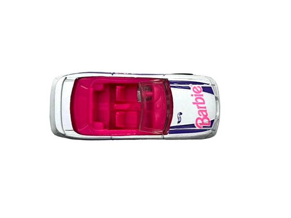 Hot Wheels Barbie 1996 Ford Mustang GT convertible, featuring a silver exterior with purple and pink branding.