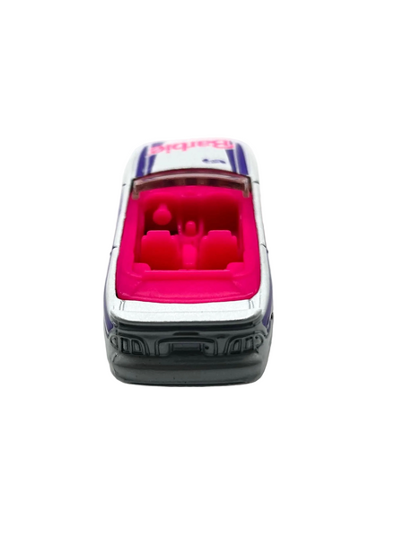 Hot Wheels Barbie 1996 Ford Mustang GT convertible, featuring a silver exterior with purple and pink branding.