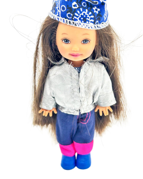Introducing Belinda, a cherished friend of Kelly, Barbie's beloved younger sister, who takes center stage in this delightful doll. 