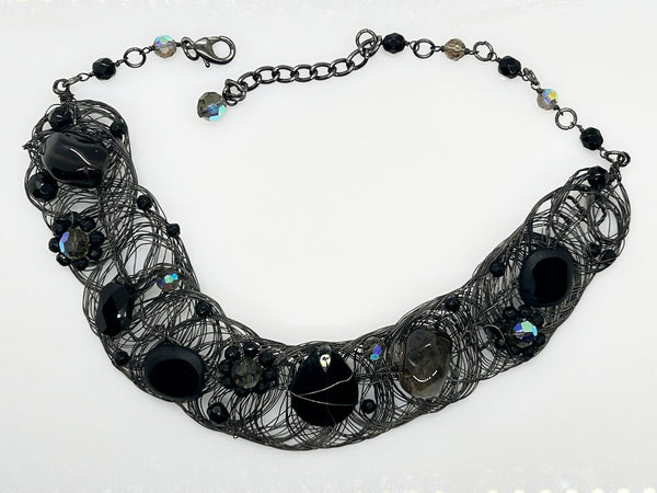 Black woven wire with stones necklace and adjustable fit for unique edgy style and bold elegance. The artistry and stunning apparance will make it a favorite. 