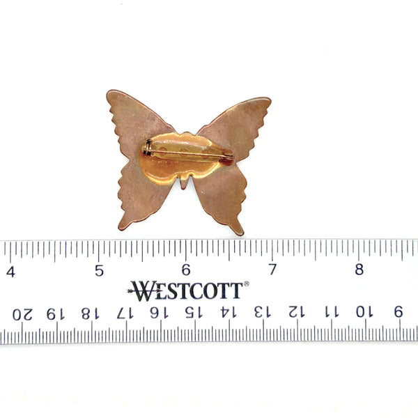 Perfect for collectors and vintage lovers: our Vintage Porcelain Blue and Cream Butterfly Brooch provides a hand-painted, unique enamel design. Shop today!