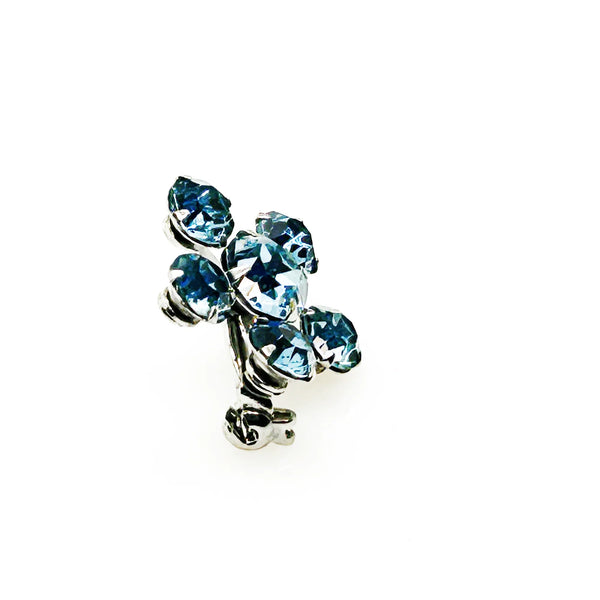 Measuring a delicate .75" across, this piece radiates timeless elegance. The unforgettable, eye-catching blue hue is beautifully complemented by the subtle "Coro" script signature discreetly placed on the back of the piece, adding a touch of authenticity and sophistication to this charming vintage treasure.