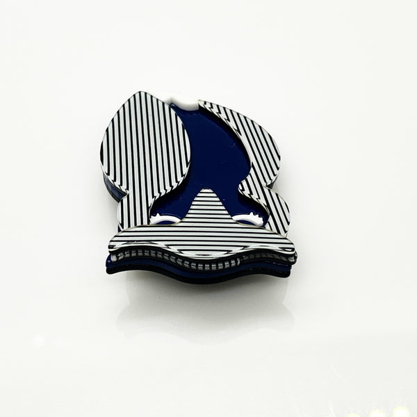 Shop this vintage-style striped owl brooch. A bold blue and white acrylic mod pin perfect for adding retro 70s op art charm to blazers and coats