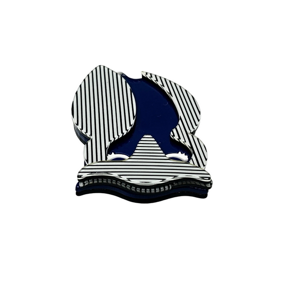 Shop this vintage-style striped owl brooch. A bold blue and white acrylic mod pin perfect for adding retro 70s op art charm to blazers and coats