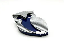 Shop this vintage-style striped owl brooch. A bold blue and white acrylic mod pin perfect for adding retro 70s op art charm to blazers and coats
