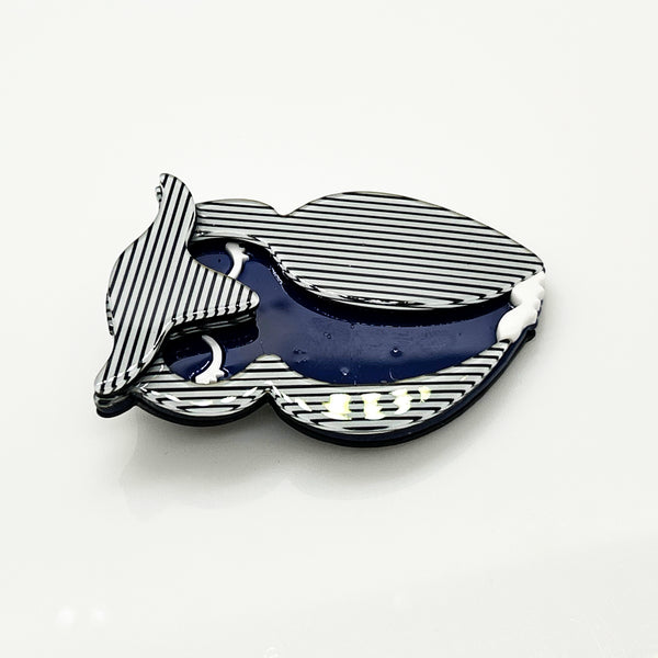 Shop this vintage-style striped owl brooch. A bold blue and white acrylic mod pin perfect for adding retro 70s op art charm to blazers and coats