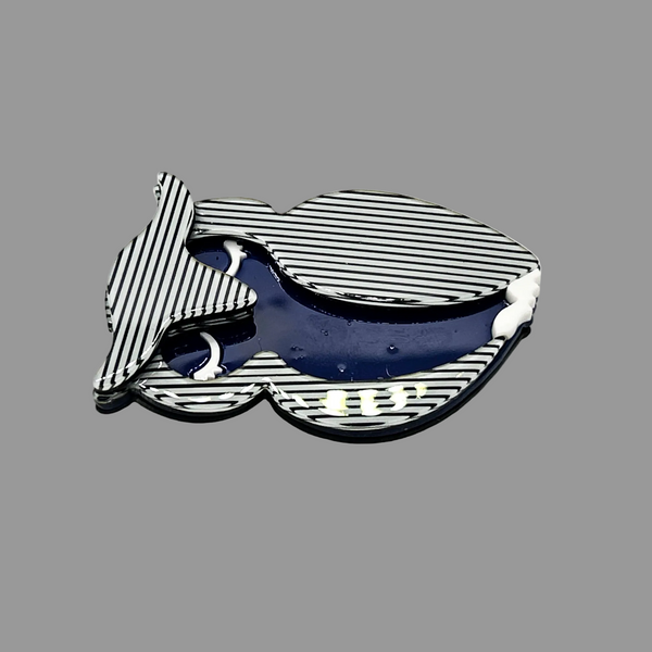 Shop this vintage-style striped owl brooch. A bold blue and white acrylic mod pin perfect for adding retro 70s op art charm to blazers and coats