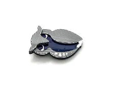 Shop this vintage-style striped owl brooch. A bold blue and white acrylic mod pin perfect for adding retro 70s op art charm to blazers and coats