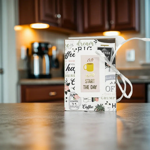 Start your day off with a smile with this coffee-inspired handmade mini album. Designed with images of coffee, it's a must-have for coffee lovers. This unique album is made with high-quality materials like acid-free paper, ribbon, and chipboard, so you can keep your memories safe for years to come.