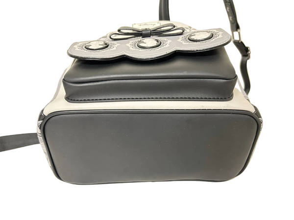 Loungefly Disney Princess Cameo Portraits Mini Backpack—a stunning 2024 release that celebrates timeless elegance! This cream vegan leather beauty showcases exquisite silhouette portraits of your favorite Disney Princesses in sophisticated black and white.