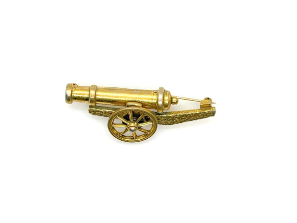 Robert Zentall vintage gold-tone artillery cannon brooch pin featuring a highly detailed textured finish and an articulated turning spoked wheel shown against a plain white background