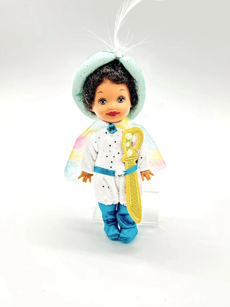 Mattel Kelly Club Tommy doll as Colonel Candy from the 2001 film Barbie in the Nutcracker. This collectible features Tommy, Barbie's friend, dressed in his iconic character costume