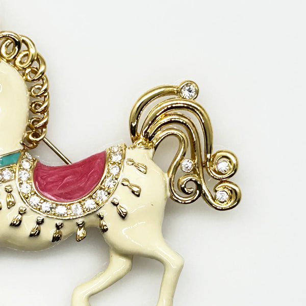 Perfect for vintage style lovers: our Bob Mackie Prancing Carousel Horse Brooch provides a dazzling, unique statement piece. Shop today!