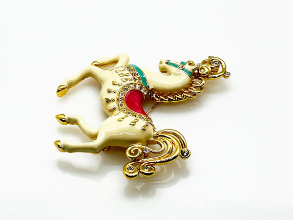 Perfect for vintage style lovers: our Bob Mackie Prancing Carousel Horse Brooch provides a dazzling, unique statement piece. Shop today!