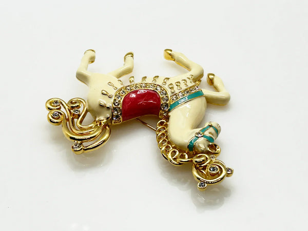 Perfect for vintage style lovers: our Bob Mackie Prancing Carousel Horse Brooch provides a dazzling, unique statement piece. Shop today!