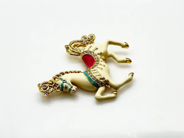 Perfect for vintage style lovers: our Bob Mackie Prancing Carousel Horse Brooch provides a dazzling, unique statement piece. Shop today!