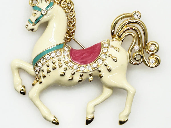 Perfect for vintage style lovers: our Bob Mackie Prancing Carousel Horse Brooch provides a dazzling, unique statement piece. Shop today!