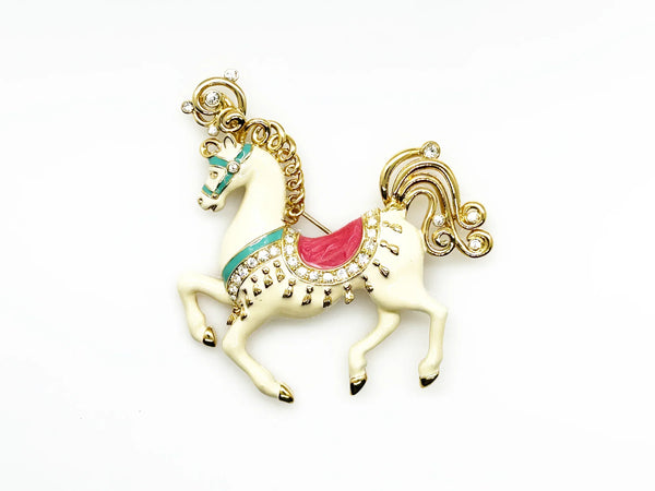 Perfect for vintage style lovers: our Bob Mackie Prancing Carousel Horse Brooch provides a dazzling, unique statement piece. Shop today!