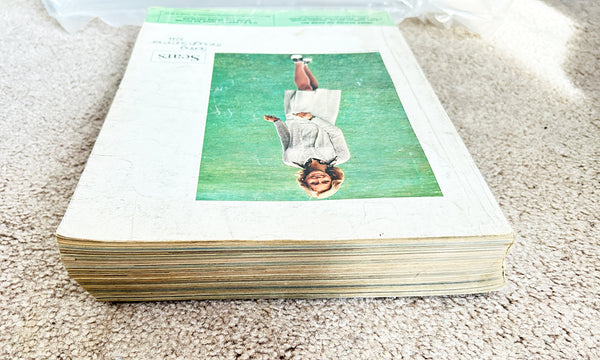 (Detail of condition) - Buckle up for a wild ride through 1974 with this gloriously thick Sears catalog—all 1427 pages of it! 