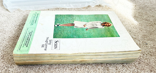 (Detail of condition) - Buckle up for a wild ride through 1974 with this gloriously thick Sears catalog—all 1427 pages of it! 