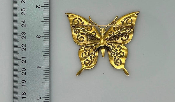 Crown Trifari Gold Tone Filigree Butterfly Brooch with Blue Eyes - Lamoree’s Vintage