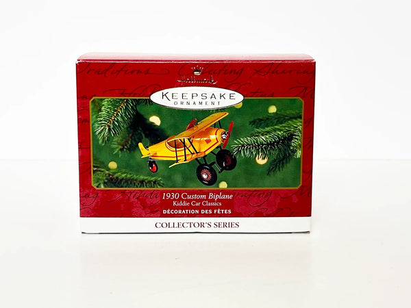 Perfect for collectors and aviation fans: our Hallmark Keepsake Ornament 1930 Custom Biplane provides nostalgic charm with a spinning propeller. Shop today!