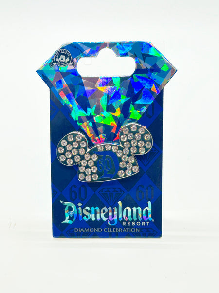 Disneyland Resort diamond celebration pin with colorful design on a blue card