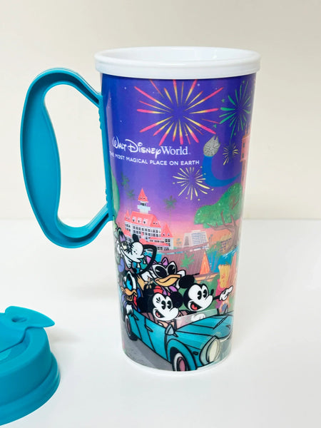 Disney World mug with cartoon characters and colorful design on a white background