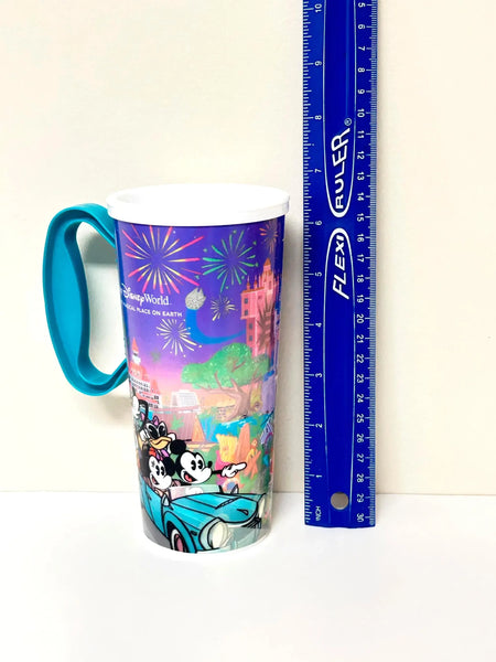 Disney World mug with cartoon characters and colorful design on a white background