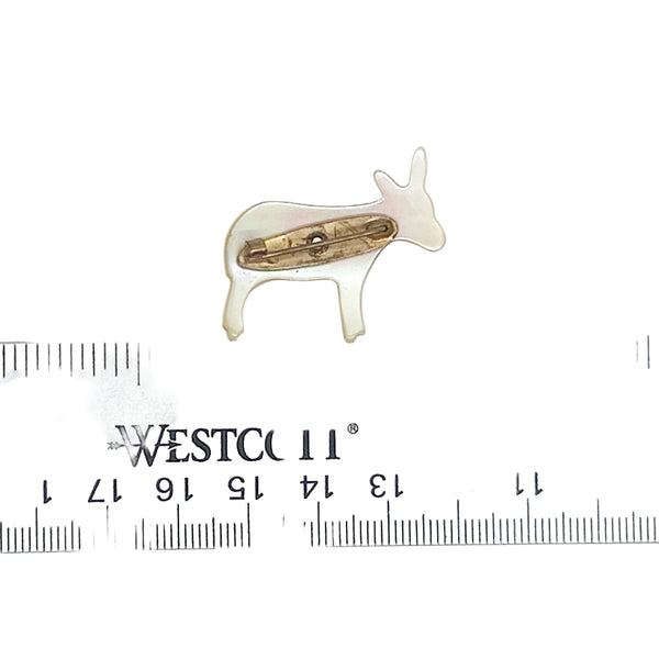 This sweet vintage mother of pearl donkey brooch, measures 1.25” and is in very good condition. The detail is lovely and the design is unusual. Unleash your unique sense of style with this charming vintage mother of pearl donkey brooch! 
