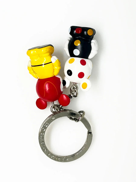 Dopey, from Snow White and the Seven Dwarves;appears as a clown themed Vinylmation Jr.stylized version of himself with a Mickey theme, along with a polka-dotted version.