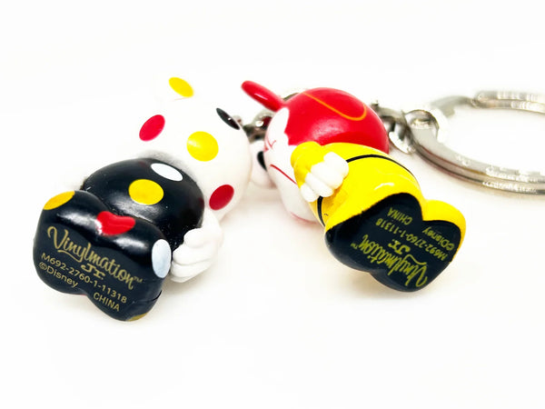 Dopey, from Snow White and the Seven Dwarves;appears as a clown themed Vinylmation Jr.stylized version of himself with a Mickey theme, along with a polka-dotted version.