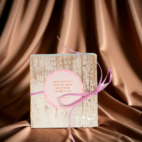 Capture your memories with this one-of-a-kind handcrafted mini album featuring beautiful shades of pink, mauve, magenta and more. The reflective foil trim adds a touch of elegance, while the deep pink ribbon closure makes it a truly special keepsake. With spaces for photos or notes, this album allows you to document your life in a stylish and meaningful way. 