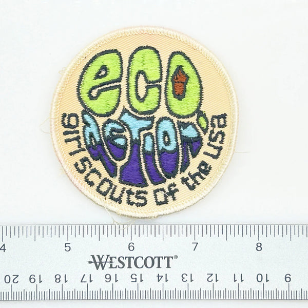 The patch was designed to symbolize the Girl Scouts' commitment to ecology and environmental conservation. Girls could earn the badge by participating in activities related to conservation, recycling, nature education, and taking action on local environmental issues. The "Eco Action" badge is now a retired patch and is considered a collectible item.